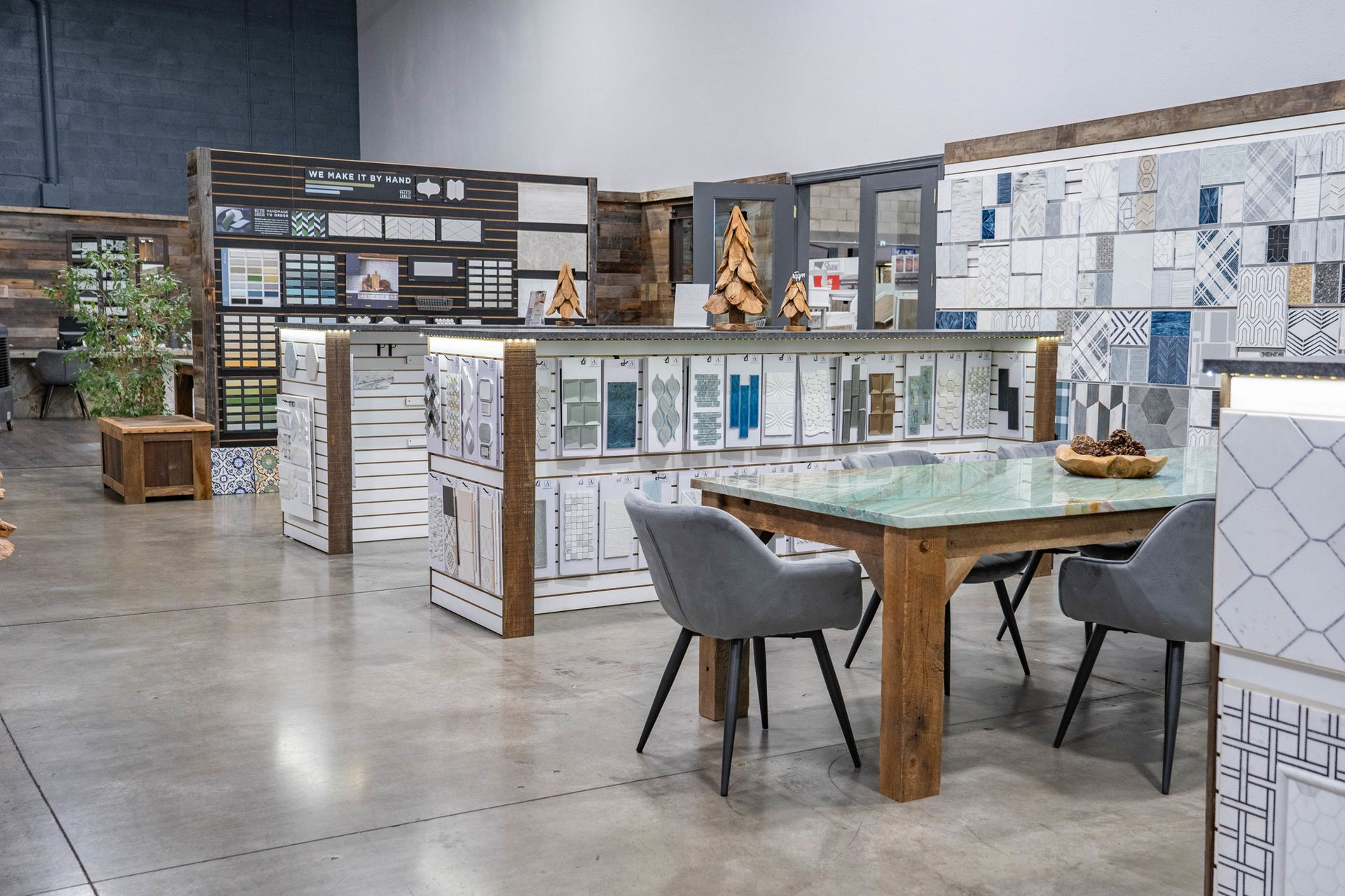 Tile sample boards and design consultation table at Nova Tile and Stone showroom in Minden NV