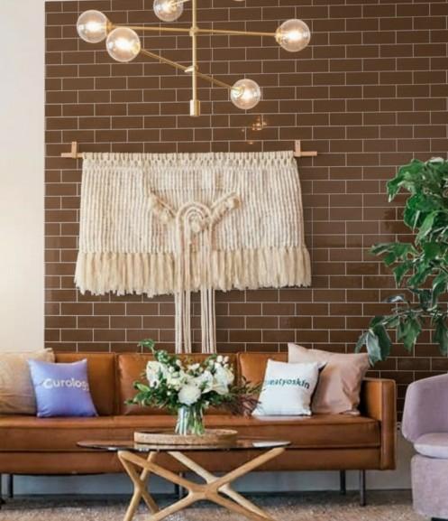 Ceramic brown subway tile showing texture and finish in a living room
