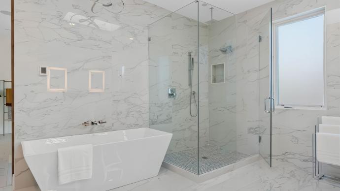 Luxe calacatta matte polished marble porcelain tile as bathroom interior design inspiration