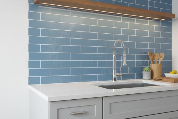 Powder blue ceramic subway tiles with white grout kitchen installation