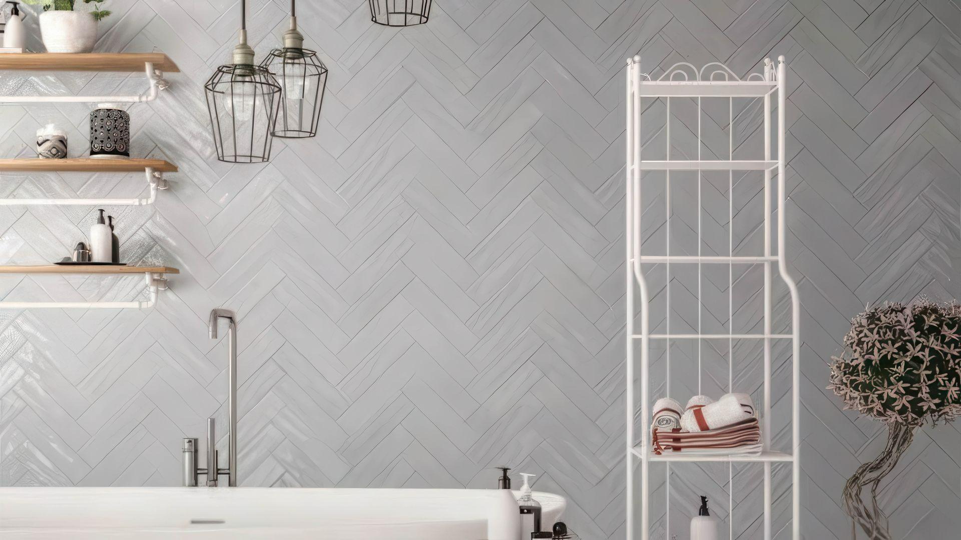 Gray subway tiles in herringbone pattern bathroom