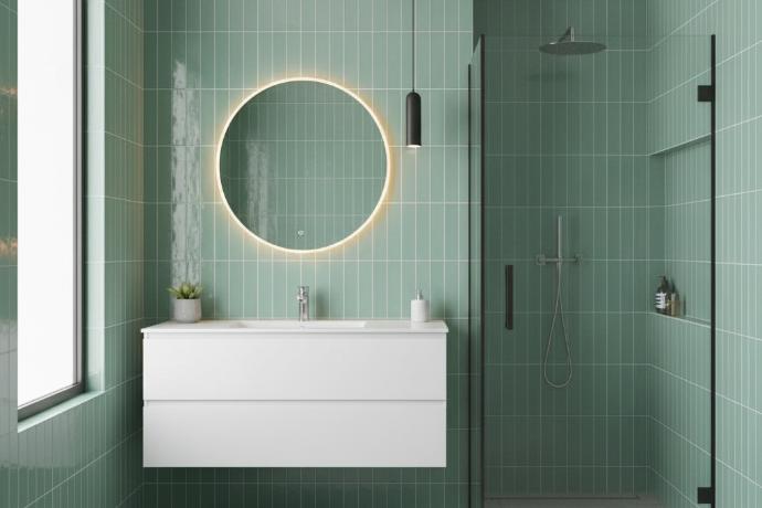 Vertical mint subway tile installation in modern bathroom