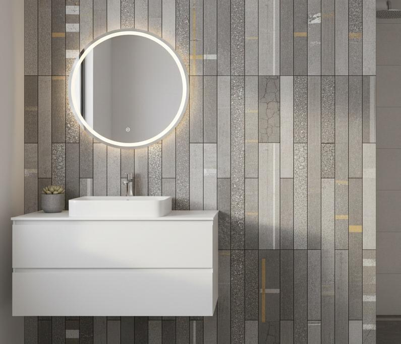 Bathroom accent wall featuring city sidewalk subway tile in vertical pattern