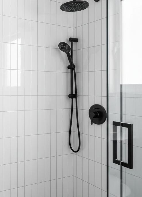 Vertical white subway tiles in modern bathroom creating height illusion