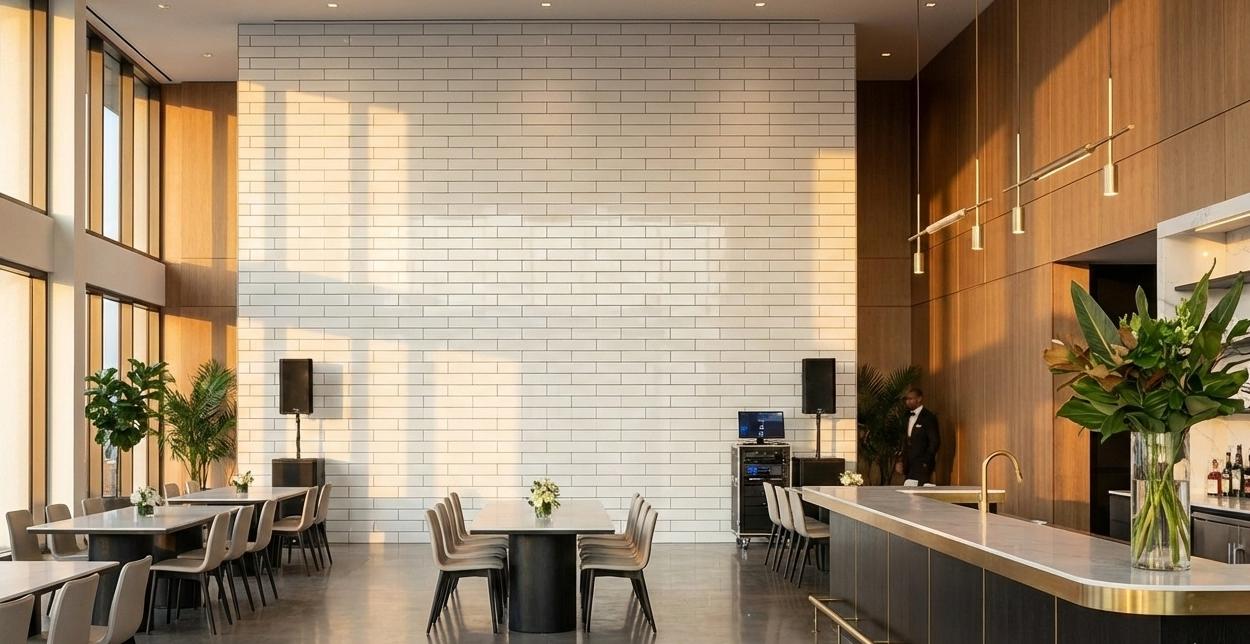 Horizontal 3x6 white subway tile installed on modern function hall