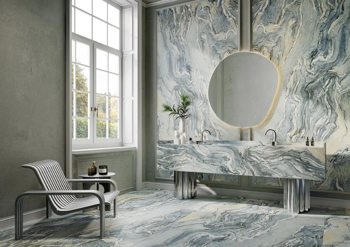 Iconic Cipollino Porcelain Slabs covering bathroom walls and floor with round mirror above.