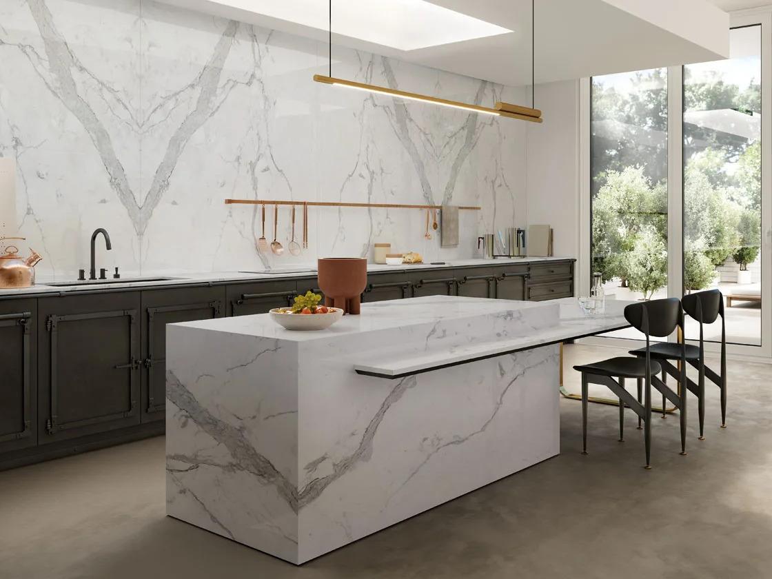 Statuario Principe porcelain slabs used on kitchen island and full wall backsplash area