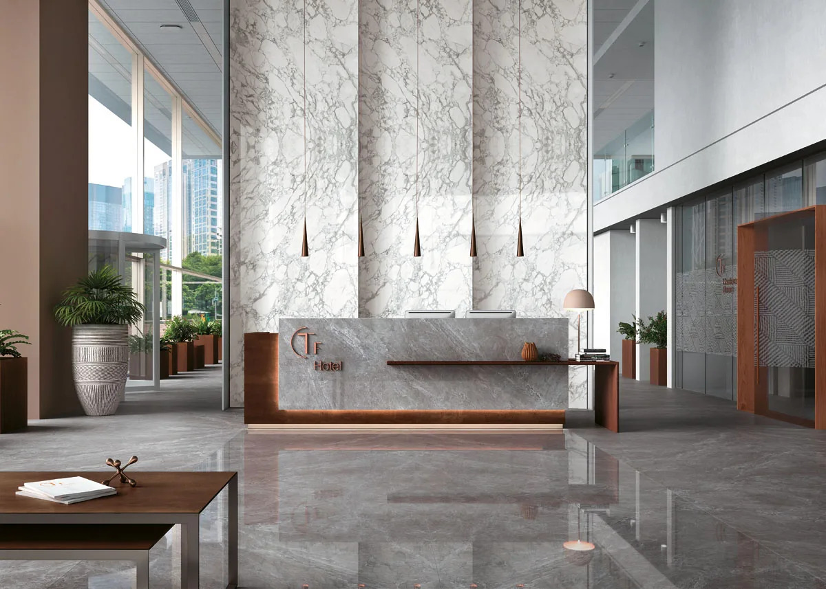Spacious commercial lobby with Tundra Select porcelain slabs on floors and feature walls.