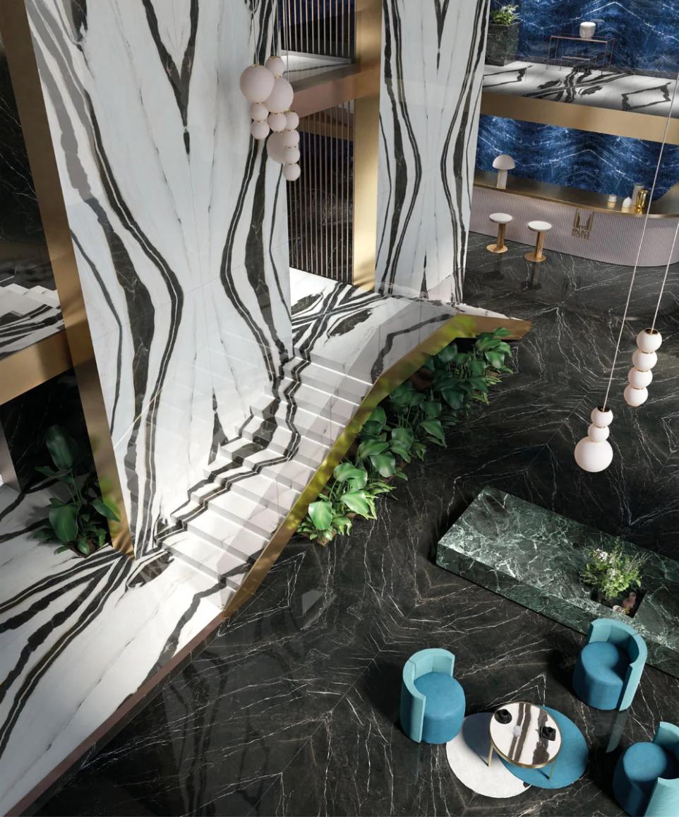 Grand interior featuring Nero Marquinia porcelain slabs on floors paired with bold veined walls.