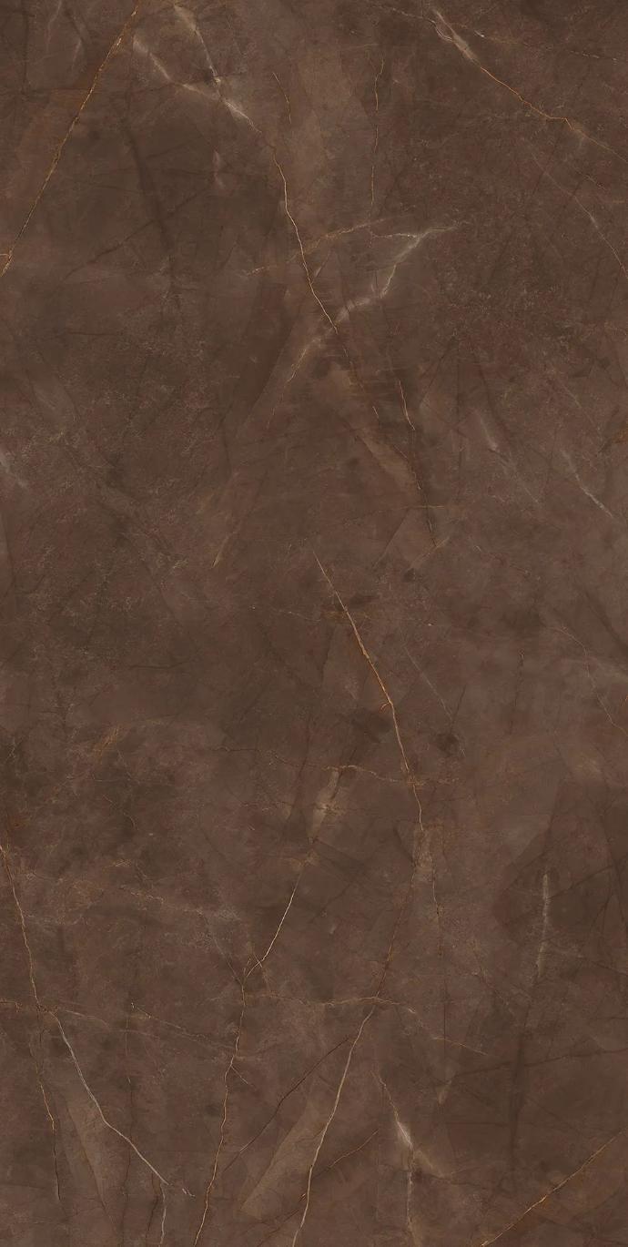 Pulpis Brown porcelain slabs featuring warm chocolate brown tones with subtle golden veining details.