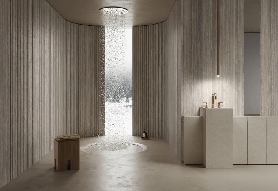 Luxury spa bathroom with Travertino Trilogy porcelain slabs on curved walls and rain shower feature.