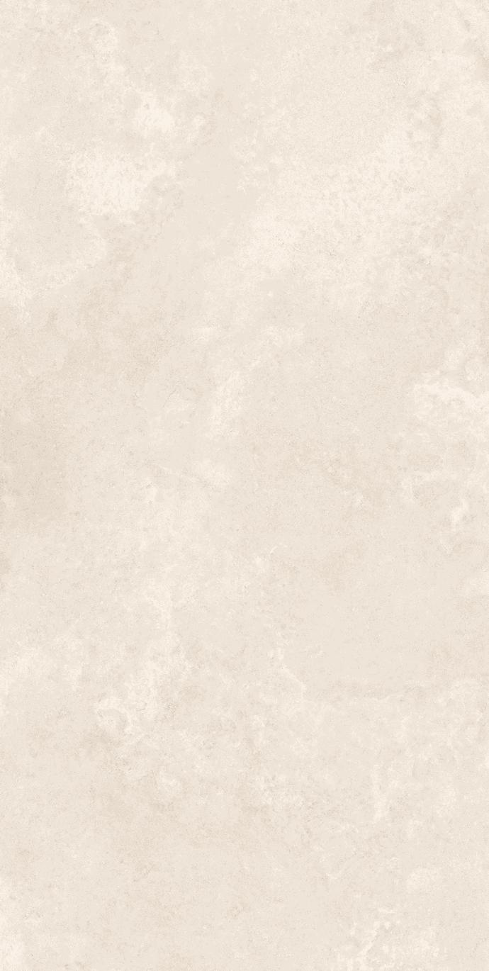 Close-up of Chianca di Ostuni porcelain slabs showing subtle cream and beige color variations.