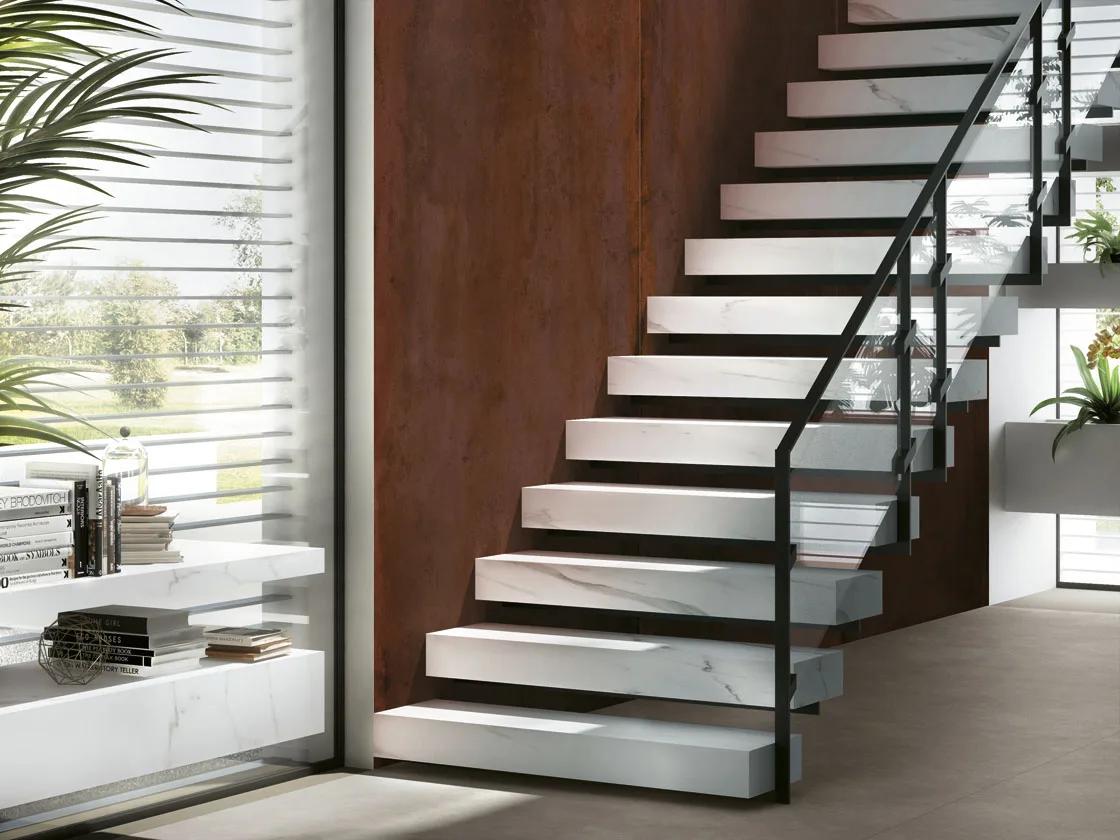 Floating staircase design with Metal Corten porcelain slabs wall accent and modern architectural details