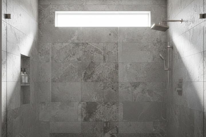 Grey stone-texture subway tiles in contemporary bathroom shower