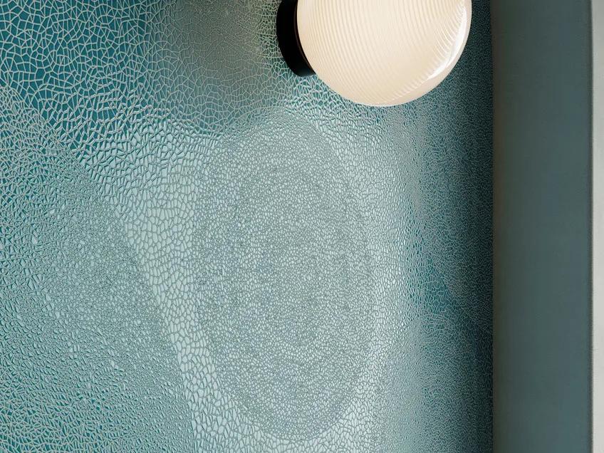 Holos Andaman Emerald Porcelain Slabs vertical wall panel displaying rich emerald green tesserae effect.