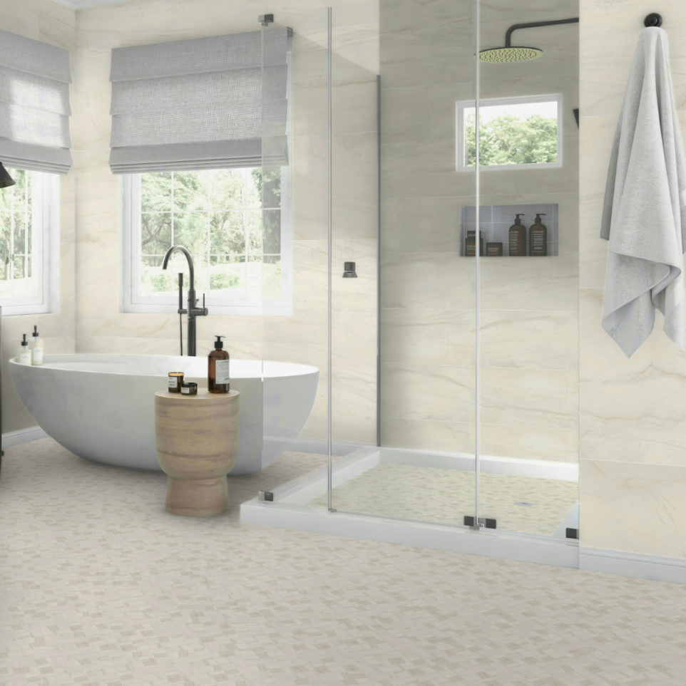 Alaska white marble look herringbone mosaic porcelain tile installed on spa bathroom floor