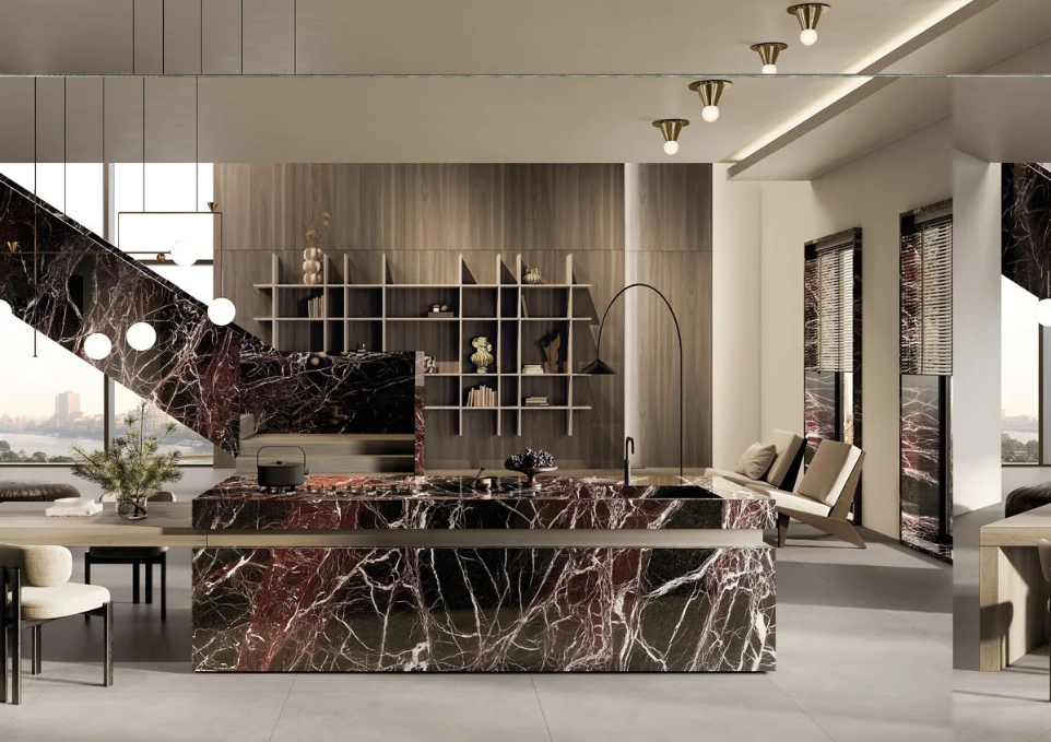 Open living space with Rosso Domus porcelain slabs on countertops and walls.