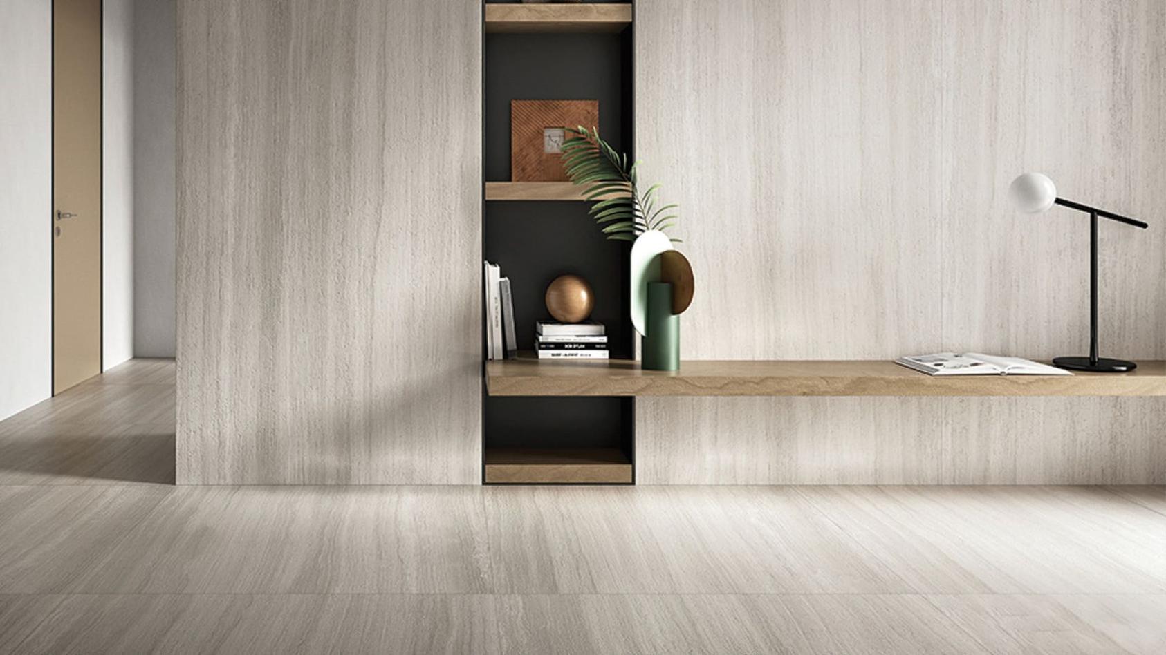 Modern living room featuring a large accent wall made from grigio colored torrent travertine look porcelain tile