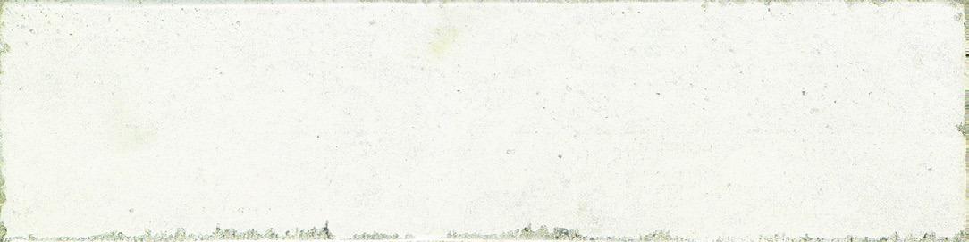 Close-up of a Nantes Bianco tile showing its unique, handcrafted texture and soft white finish.