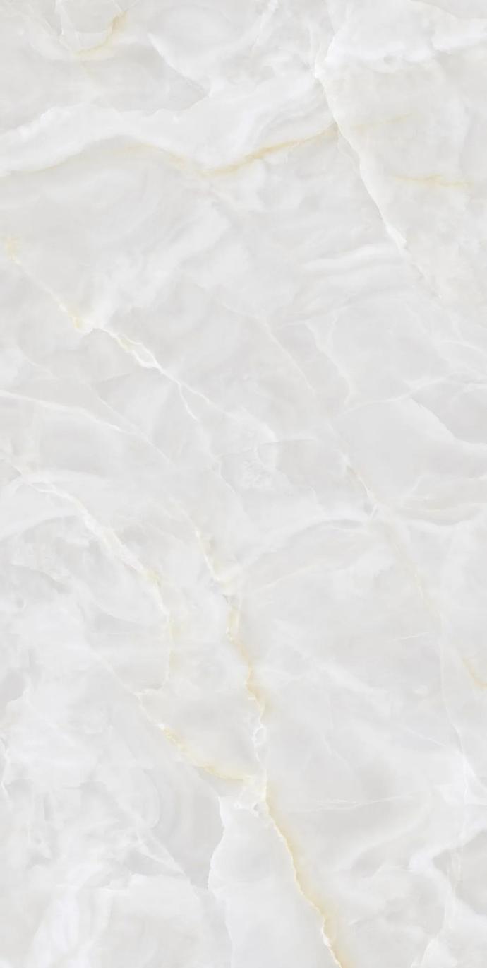 Detailed view of Onyx White porcelain slabs displaying natural onyx marble veining effects.