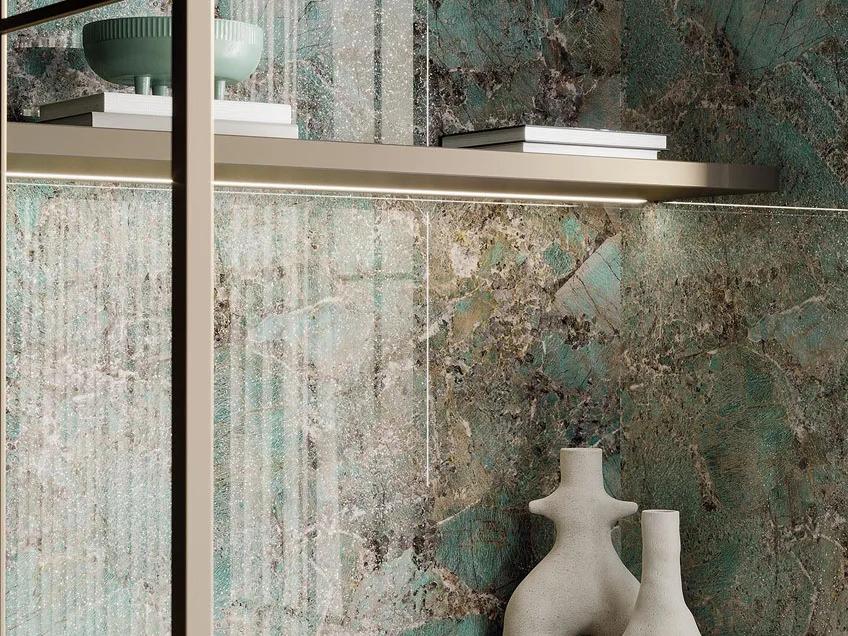 Interior shelf detail featuring Santos porcelain slabs with sophisticated onyx effect finish throughout.