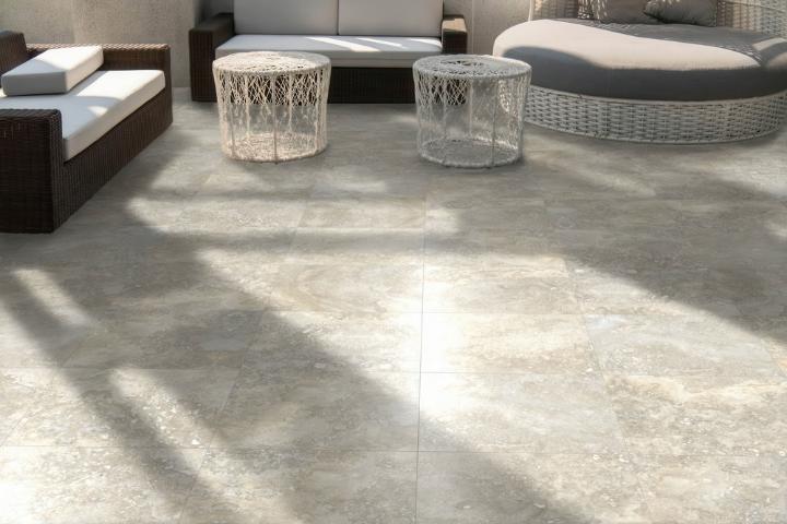 Travertine-look porcelain tile on outdoor patio