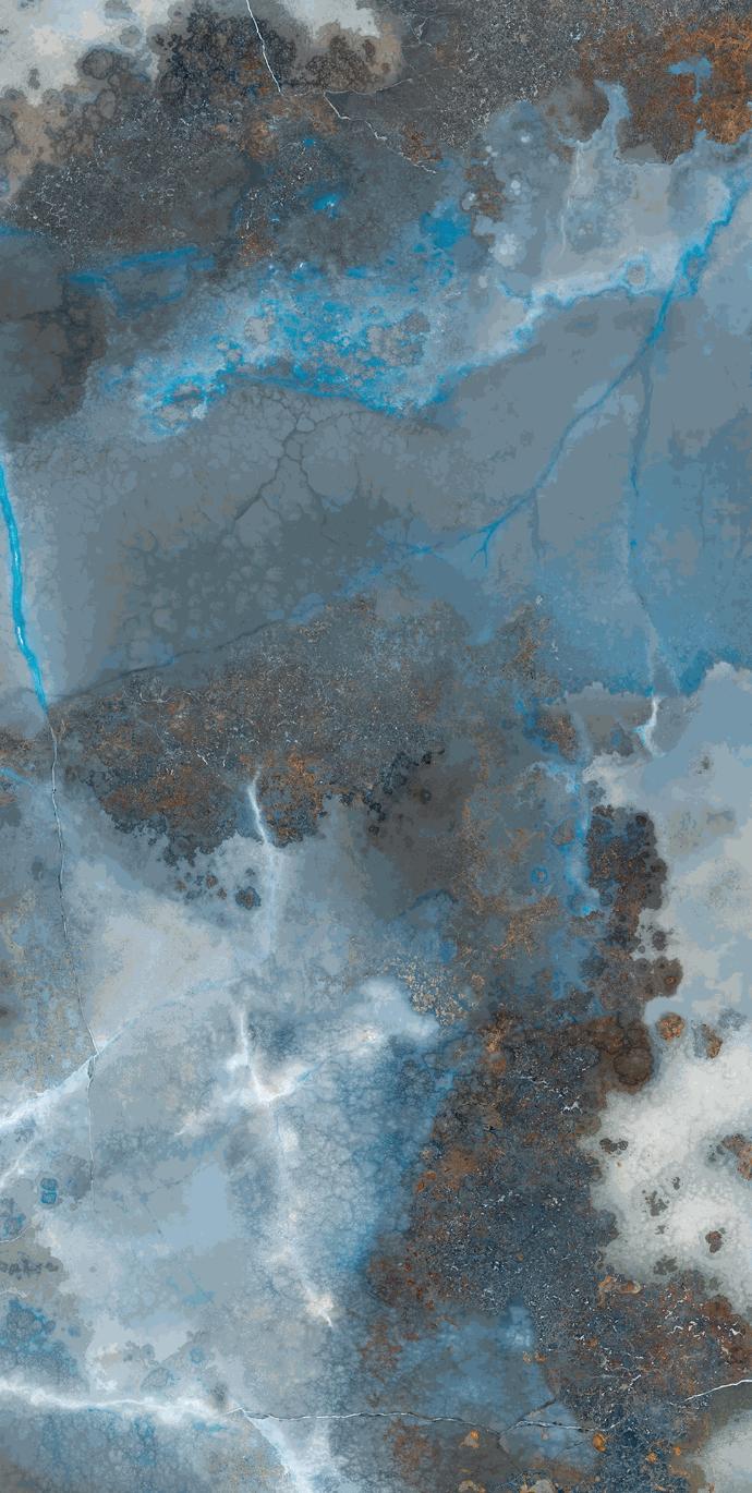 Detailed view of Thunderstorm porcelain slabs featuring stormy blue and metallic bronze patterns.