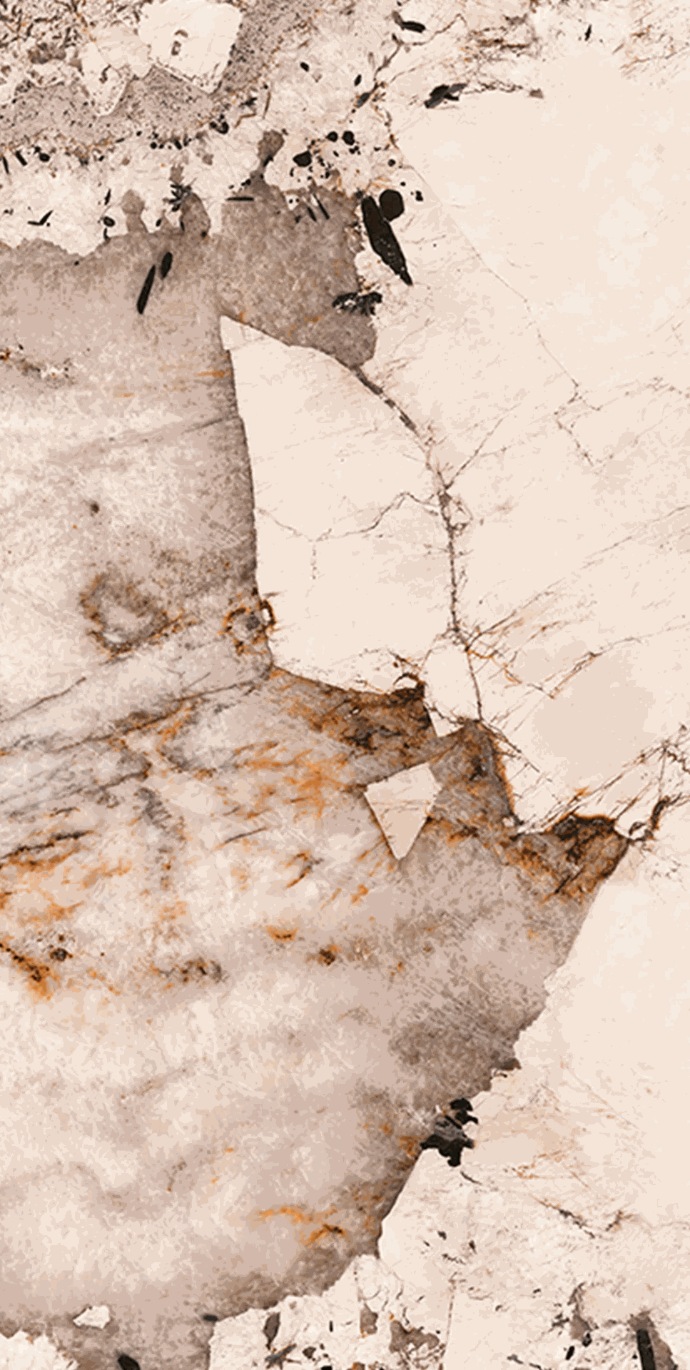 Detailed texture of Magellano porcelain slabs showing layered translucent onyx effect.