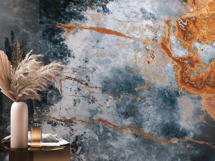 Ocean Blue porcelain slabs displayed as wall covering with pampas grass decor nearby.