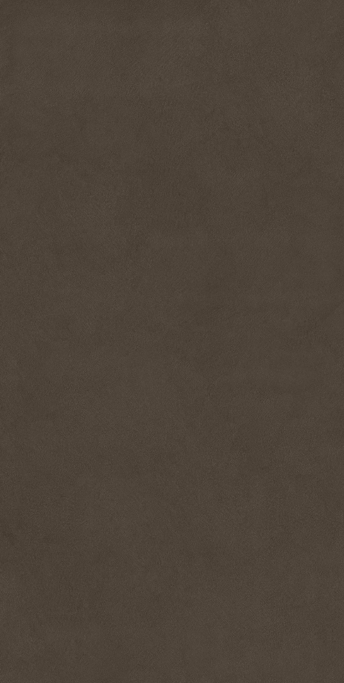 Plaster Warm porcelain slabs displaying earthy brown color with smooth matte surface texture.