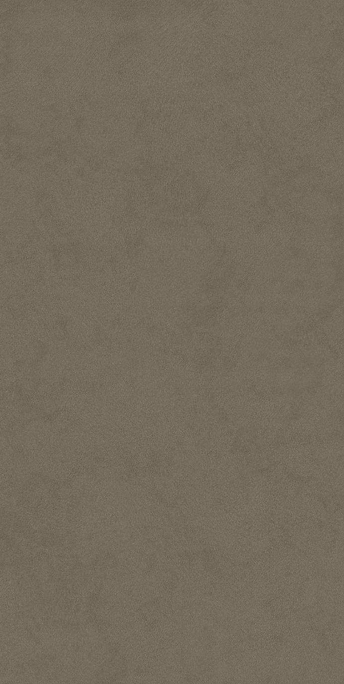 Close-up view of Plaster Ash porcelain slabs displaying subtle texture and ash gray tone.