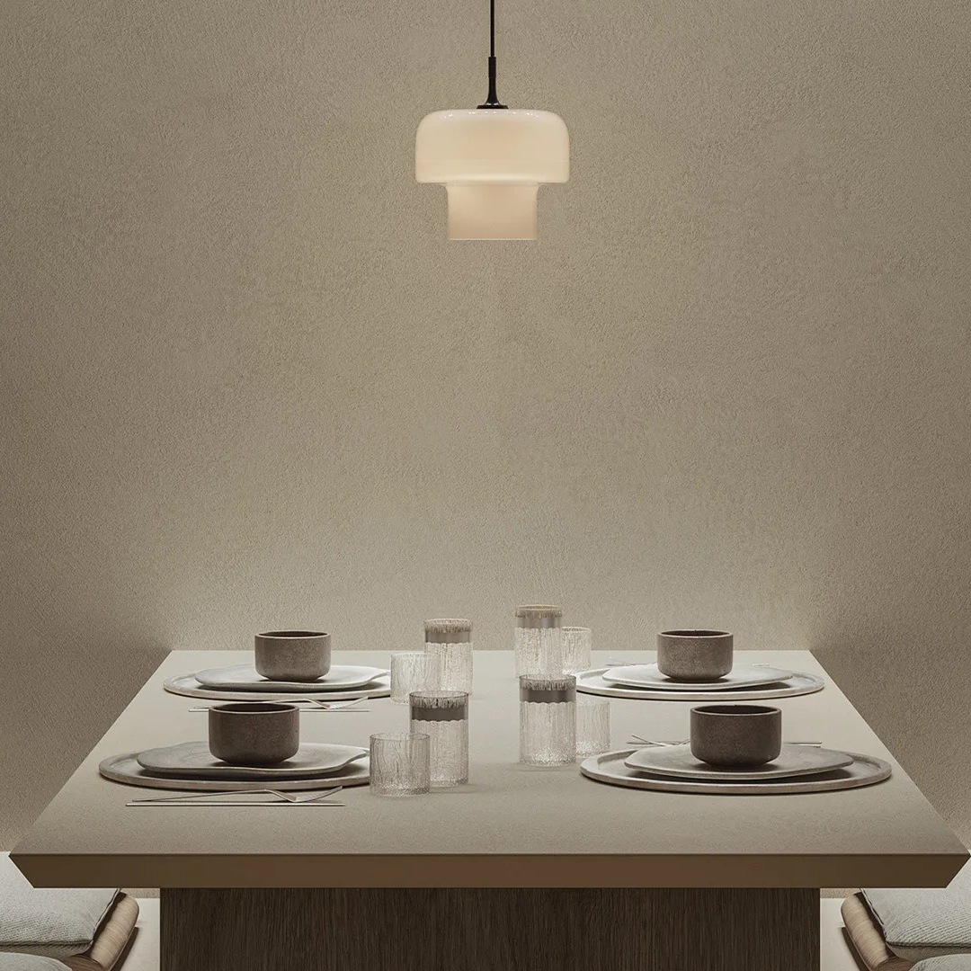 Plaster Ground porcelain slabs table surface showcasing natural texture in modern dining space.