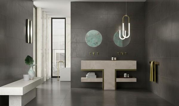 Bathroom design with dark metallic look porcelain tile.