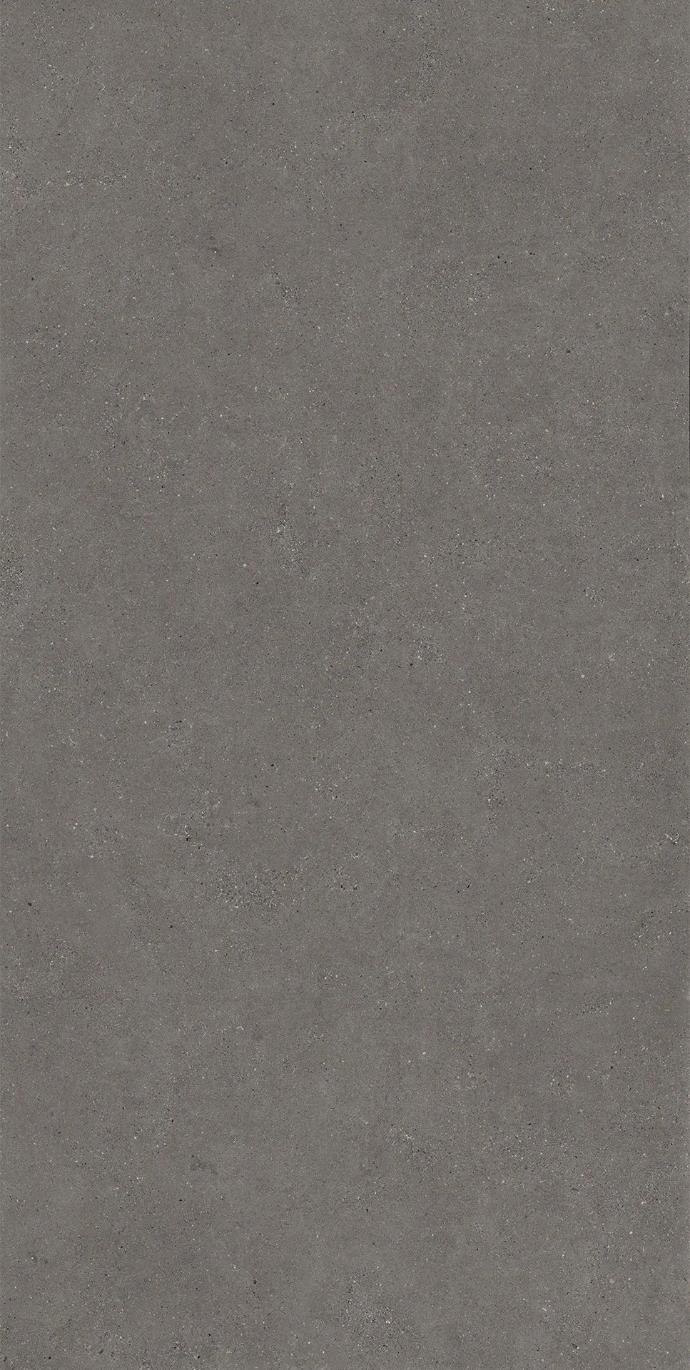 Sandstone Warm porcelain slabs sample tile displaying its warm gray tone and smooth finish.