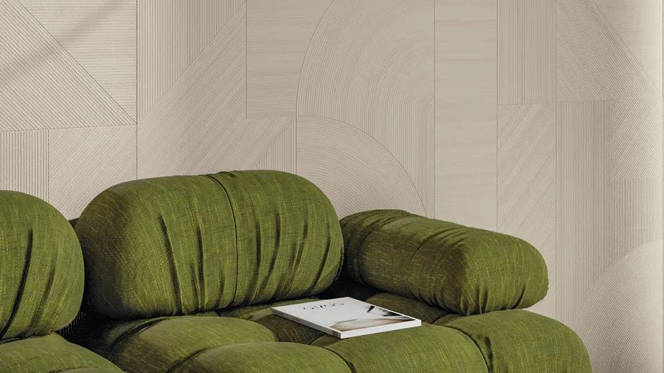 Ginza Doro porcelain slabs used as wall cladding in contemporary living space with statement furniture.