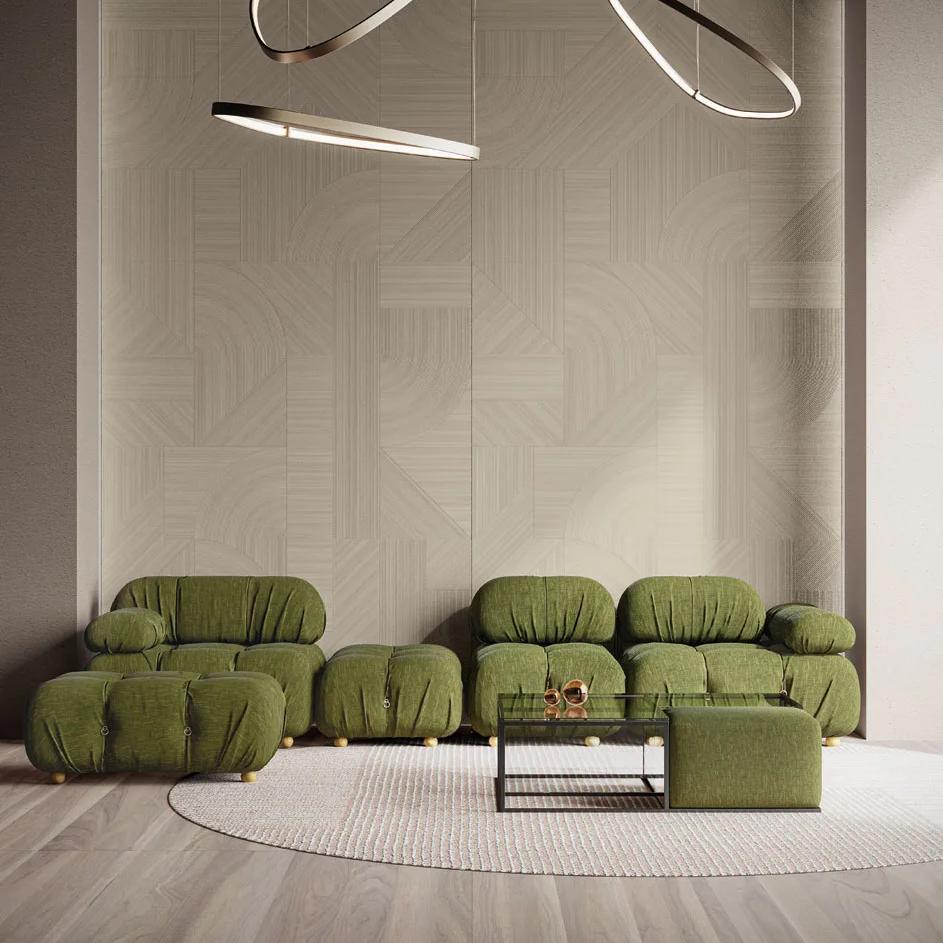 Modern living room flooring installation using Ginza Doro porcelain slabs with green contemporary furniture.