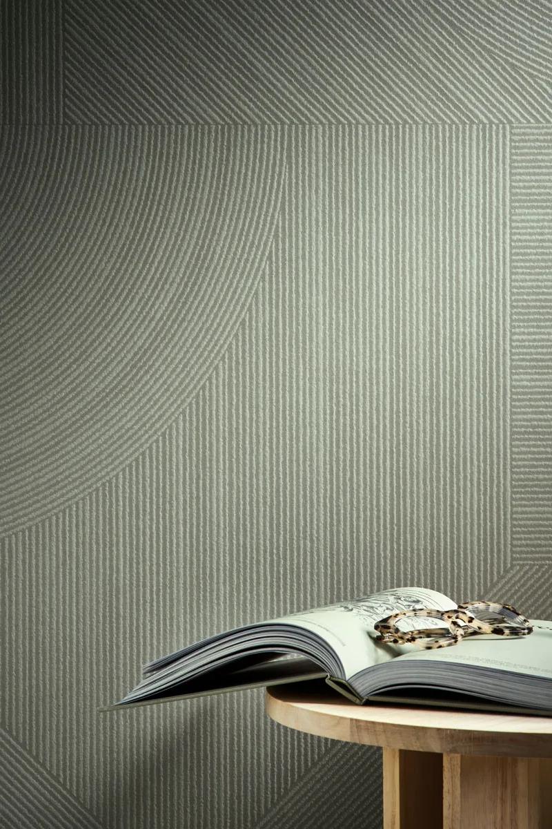 Gordes porcelain slabs installed as wall coverings showing subtle vertical texture detail.