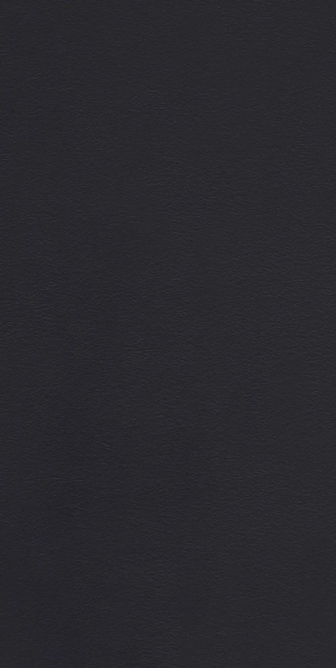 Full slab sample of Pigalle porcelain slabs showing the deep black patinated finish.