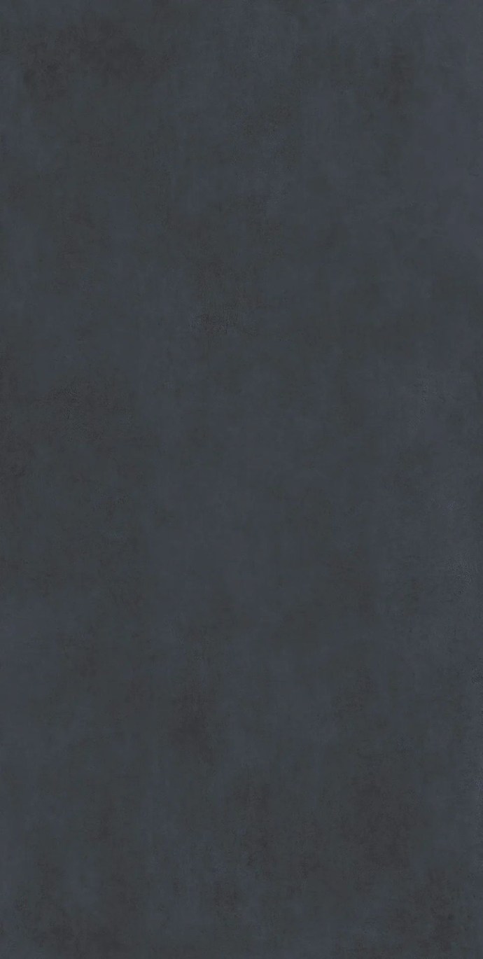 Total Black porcelain slabs close up view of the dark resin-effect surface and texture.