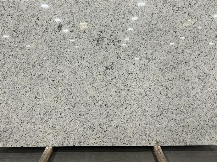 White granite slab with grey and black speckled pattern