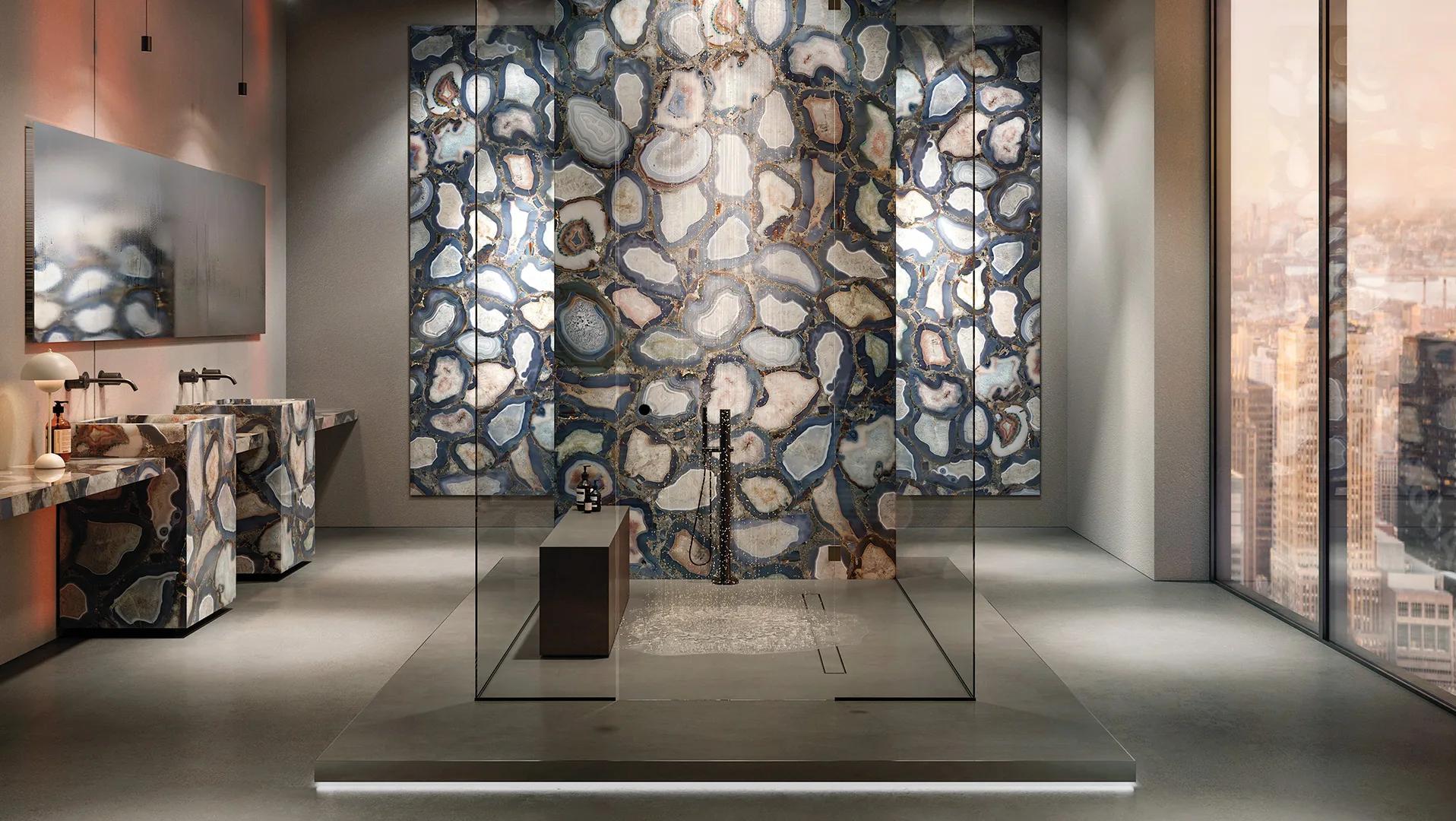 Cammeo porcelain slabs used as a statement wall in a high-rise luxury bathroom.