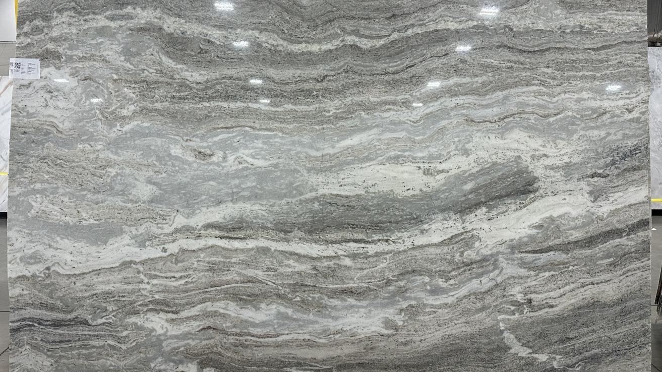 Polished Fantasy Brown dolomite slab displaying tight, undulating veins in shades of soft grey and beige