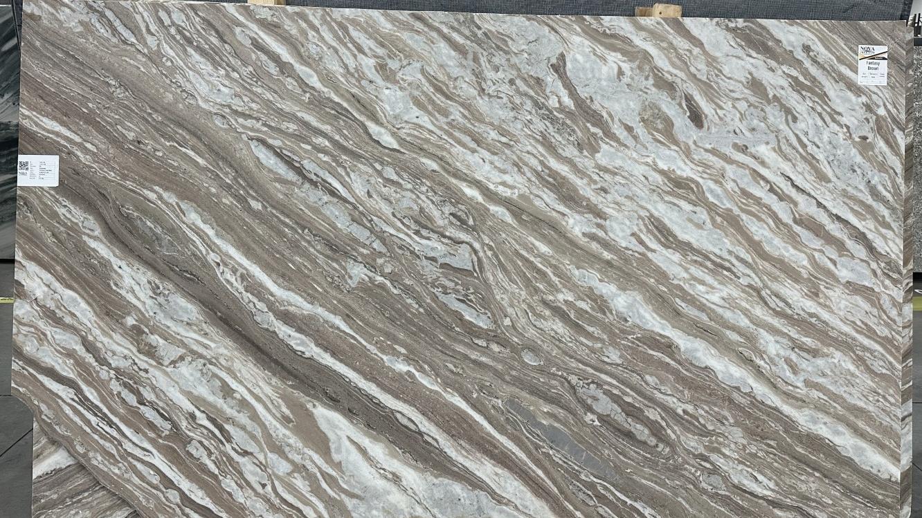 Honed Fantasy Brown dolomite slab showcasing dramatic, diagonal sweeping veins in chocolate brown, cool gray, and off-white