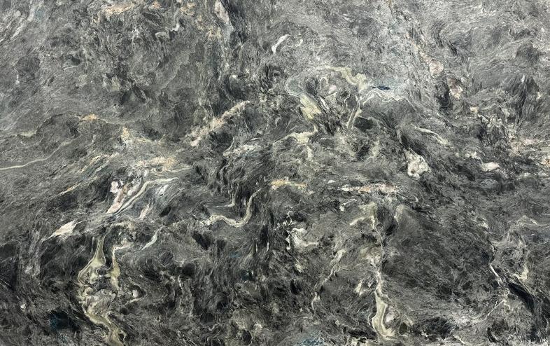 Dark gray natural stone slab with dramatic white and silver veining