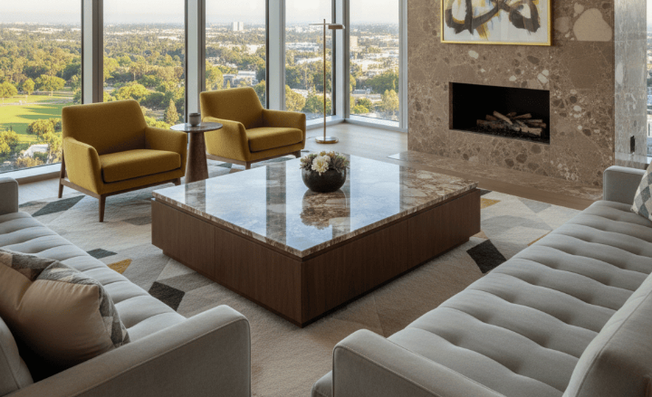 Modern living room with natural stone coffee table top, marble fireplace surround, and floor-to-ceiling city views