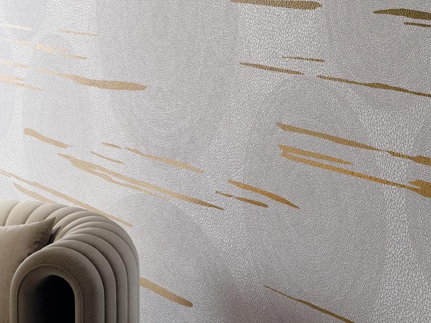 Holos Hyams White porcelain slabs showcasing a white surface with bold gold brush strokes