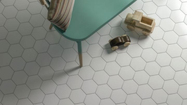 White hexagon floor tile with geometric pattern in modern interior
