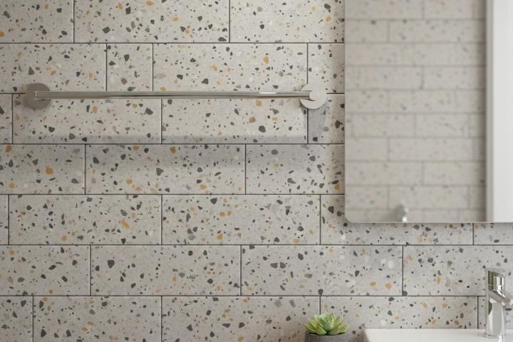 Terrazzo subway tile bathroom wall with horizontal stacked pattern