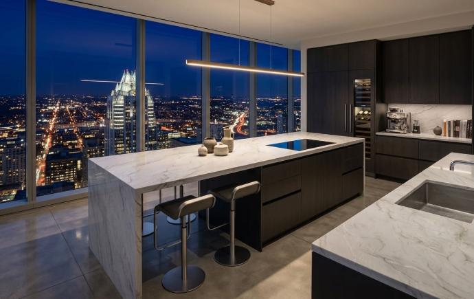 Contemporary kitchen island and countertop with Mont Blanc Quartzite