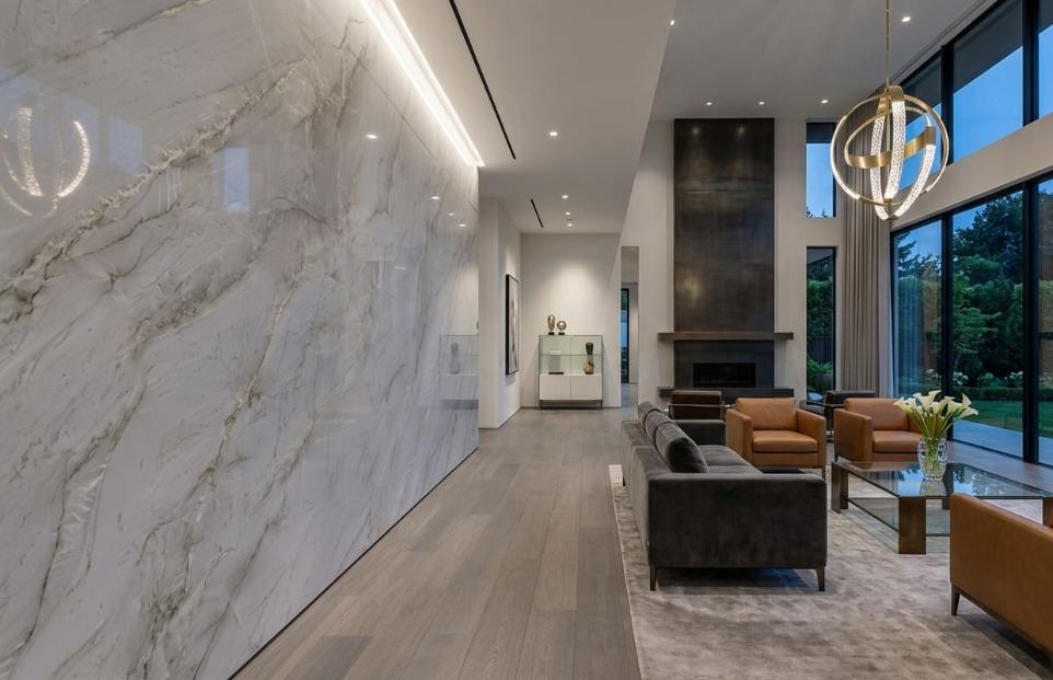 Luxury living room with polished Mont Blanc quartzite feature wall
